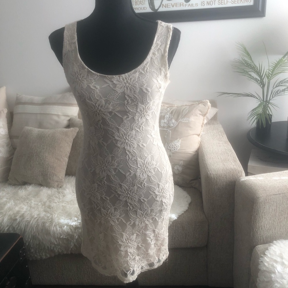Woman’s Sleeveless Cream Bodycon dress with Lace Overlay - Small